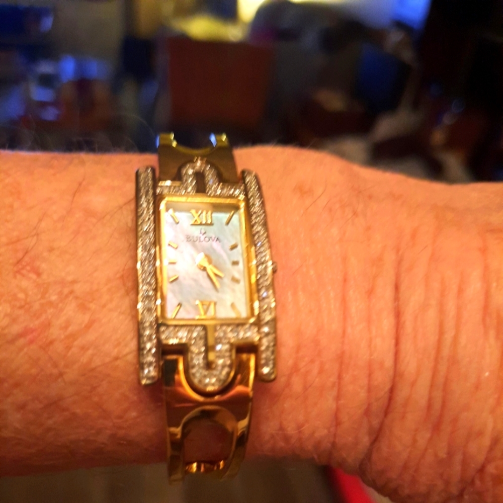 Bulova Ladies Diamonds, gold and Bangle style watch